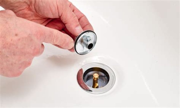 How to remove bathtub drain stopper